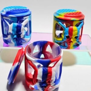 “7cm alto” Contenedor De Vidrio Con Funda De Silicon “Calavera” - (Colores al azar)